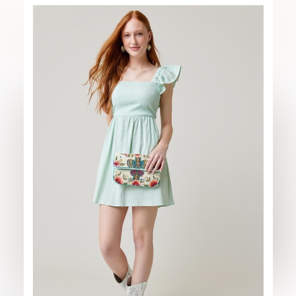 Francesca’s Mint Green Ruffle Sleeve Mini Dress
Size: Medium